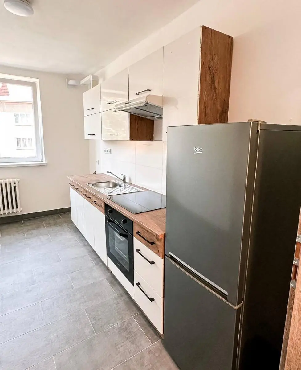 Kitchen; kitchen appliances, tile floor, renovated, natural light