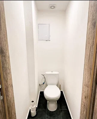 Toilet; tile floor
