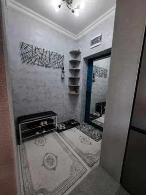 Vestiaire; carrelage, nécessite rénovation, lumière naturelle