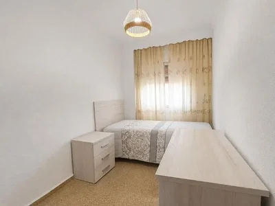 Bedroom; natural light, wood floor