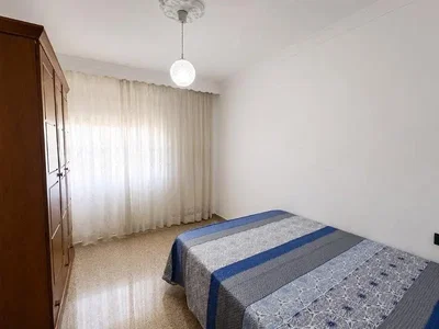 Bedroom; natural light, wood floor