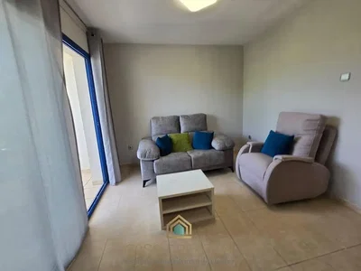 Living room; tile floor, natural light
