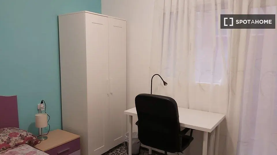Bedroom; natural light, wood floor