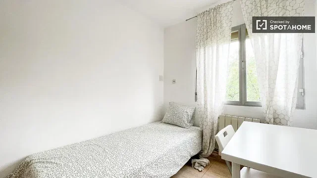Bedroom; natural light, wood floor