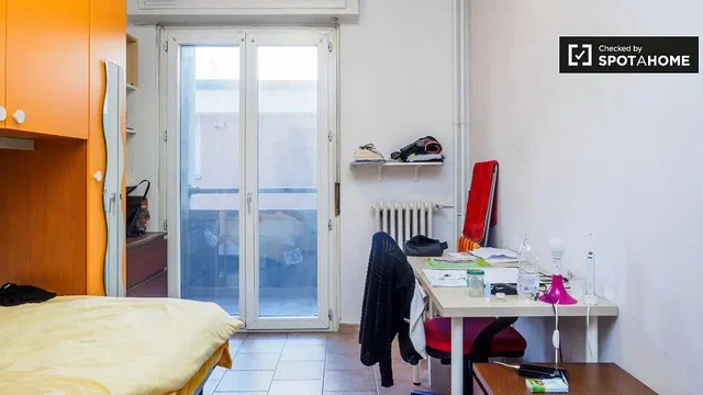 Bedroom; natural light, needs renovation, wood floor