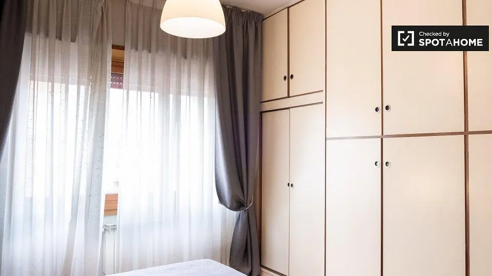 Bedroom; natural light, wood beams