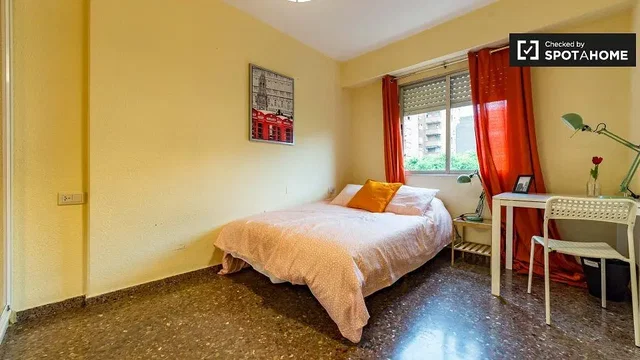 Bedroom; natural light, tile floor