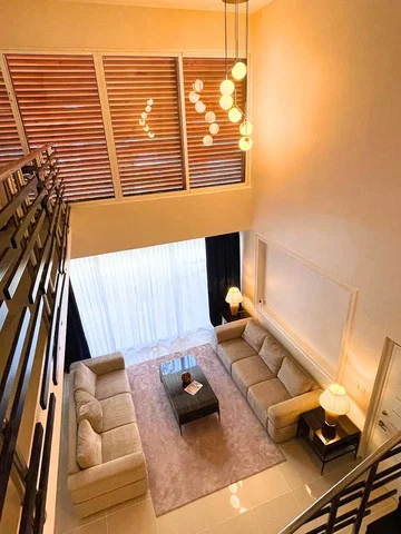 Living room; natural light, high ceiling, tile floor