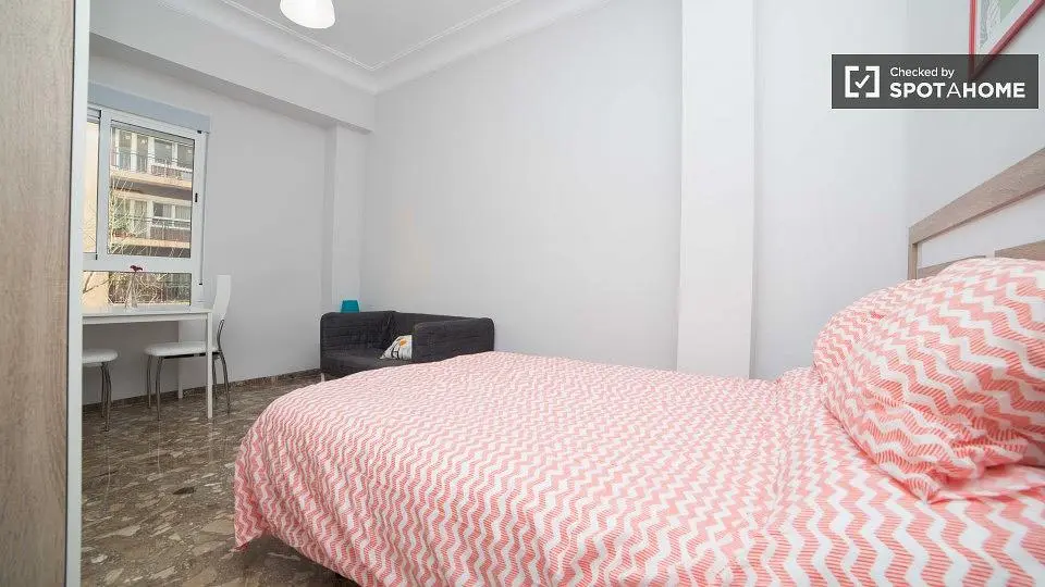 Bedroom; natural light, tile floor