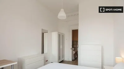 Bedroom; natural light, wood floor