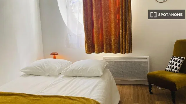 Bedroom; natural light, wood floor