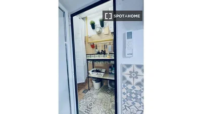 Toilet; tile floor, needs renovation