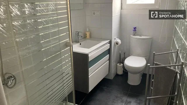 Toilet; tile floor, renovated