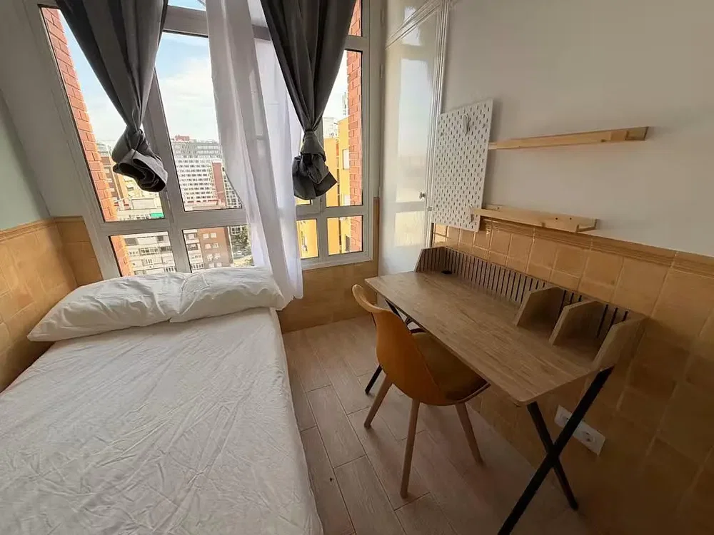 Bedroom; natural light, wood floor, tile floor