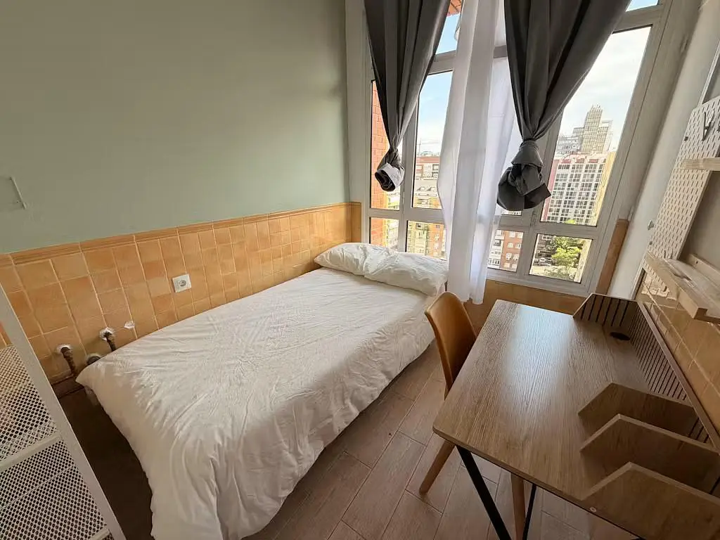 Bedroom; wood floor, natural light, view