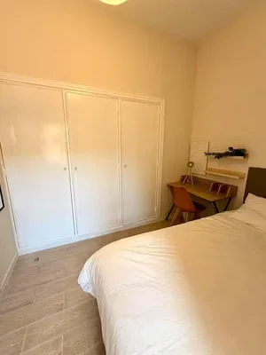 Bedroom; tile floor, natural light
