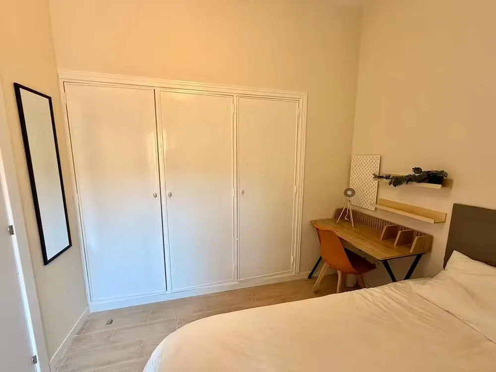 Bedroom; tile floor, natural light