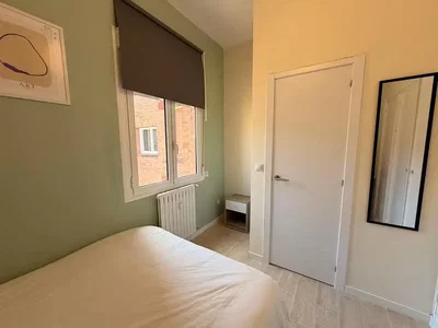 Bedroom; natural light, tile floor