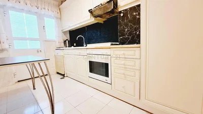 Kitchen; kitchen appliances, tile floor, natural light