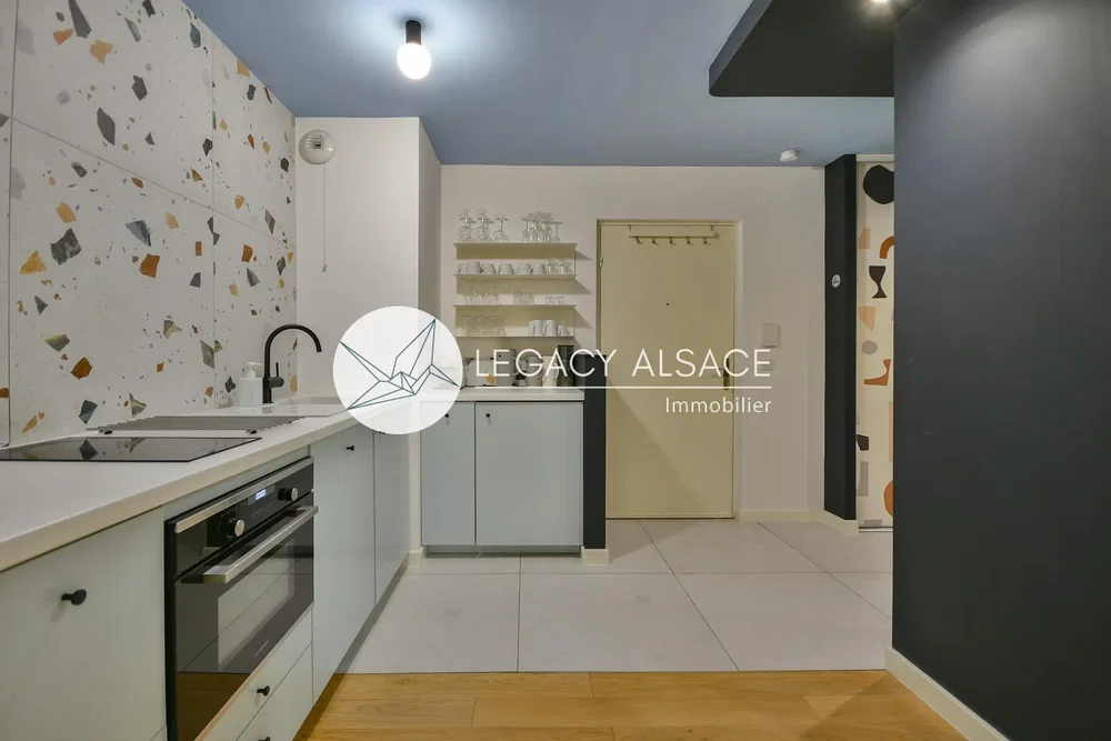 Kitchen; kitchen appliances, tile floor, natural light