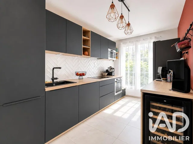 Kitchen; kitchen appliances, tile floor, natural light