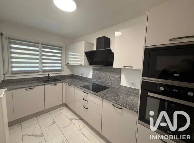 Kitchen; kitchen appliances, tile floor, natural light
