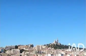 House and surroundings; view