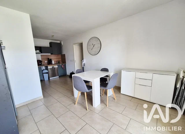 Dining room; tile floor, kitchen appliances, natural light