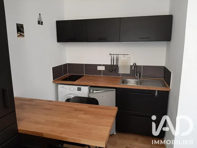 Kitchen; kitchen appliances, wood floor, renovated, natural light