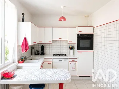Kitchen; kitchen appliances, tile floor, natural light