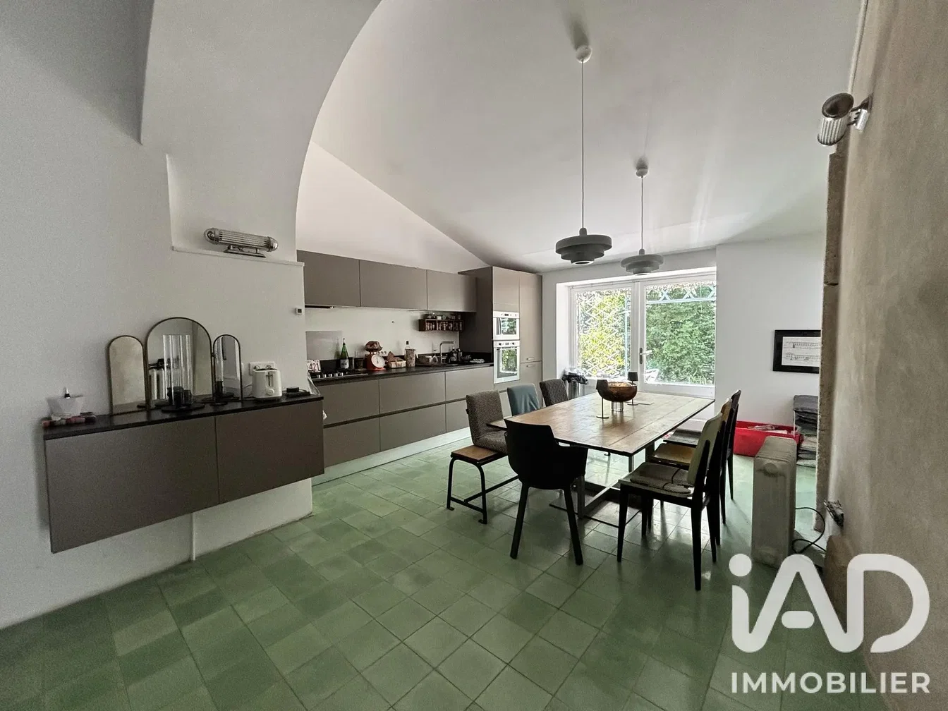Kitchen; tile floor, kitchen appliances, natural light