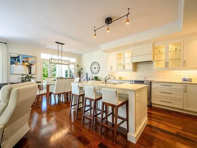 Kitchen; kitchen appliances, wood floor, natural light