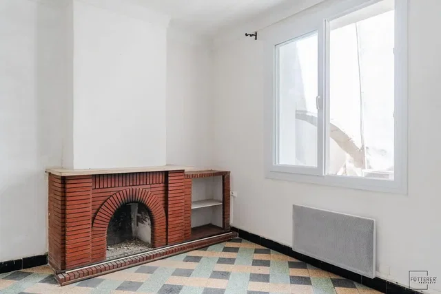 Living room; fireplace, tile floor, natural light