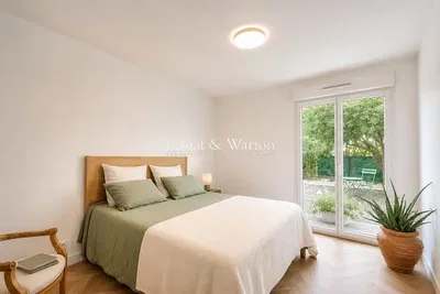Bedroom; natural light, wood floor