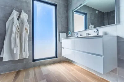Bathroom; tile floor, wood floor, natural light, renovated