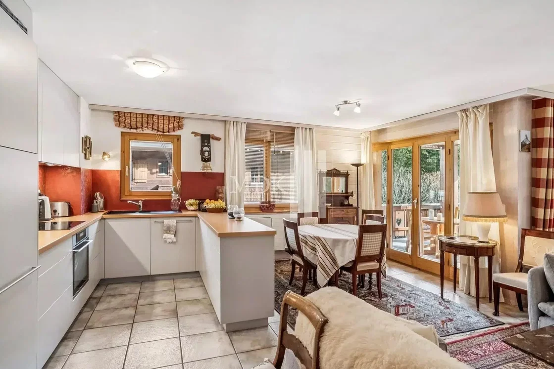 Kitchen; kitchen appliances, tile floor, natural light