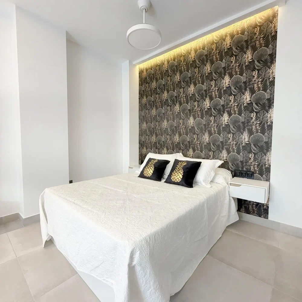 Bedroom; tile floor, natural light