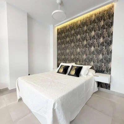 Bedroom; tile floor, natural light