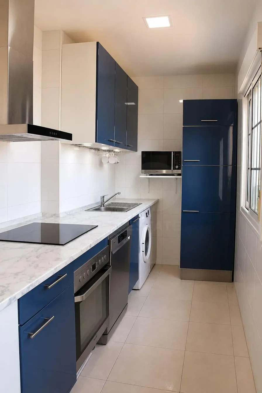 Kitchen; kitchen appliances, tile floor, renovated, natural light