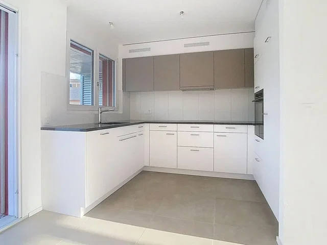 Kitchen; kitchen appliances, tile floor, natural light