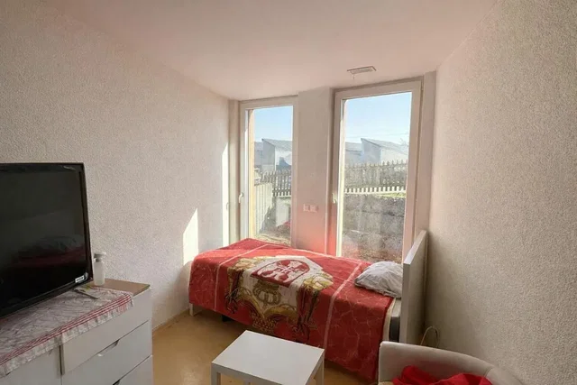 Bedroom; natural light, wood floor