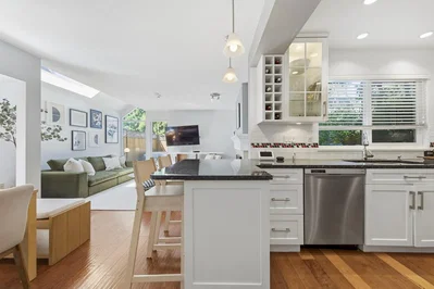 Kitchen; kitchen appliances, wood floor, natural light