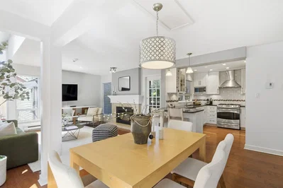 Living room; kitchen appliances, wood floor, natural light, modern style
