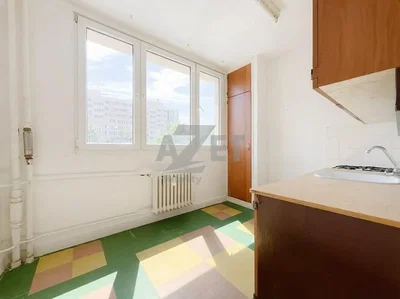 Kitchen; natural light, needs renovation, tile floor