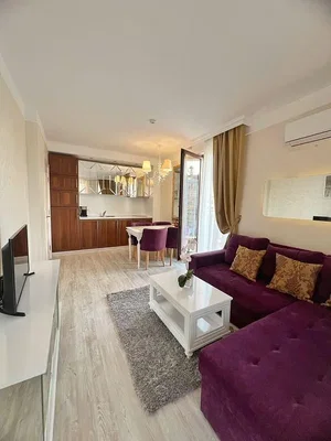Salón; luz natural, suelo de madera, estilo moderno