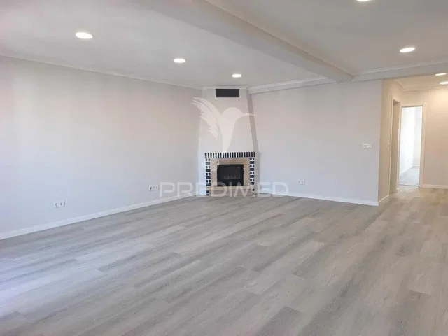 Living room; wood floor, fireplace, natural light