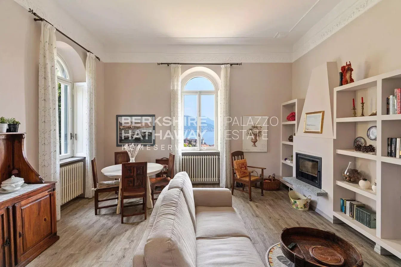 Living room; natural light, wood floor, fireplace, rustic style