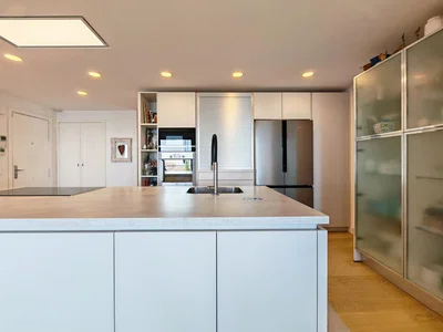 Kitchen; kitchen appliances, wood floor, natural light