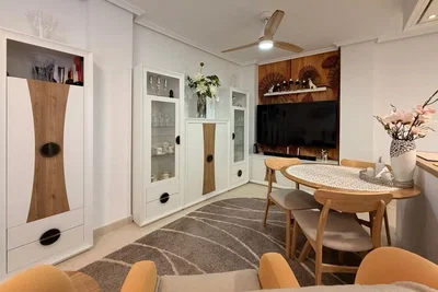 Living room; modern style, wood floor, natural light, renovated