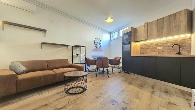 Living room; wood floor, natural light, modern style, kitchen appliances